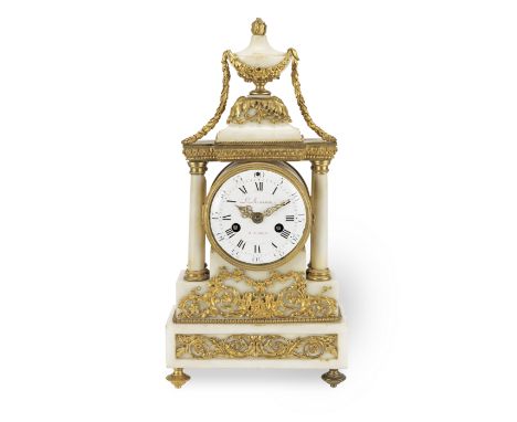 An Louis XVI style ormolu-mounted alabaster mantel clockThe dial signed L. Musson A ParisThe dial with Roman and Arabic numer