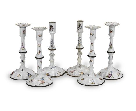 A set of six Staffordshire enamel candlesticksLate 18th centuryEnamelled with floral sprays and flower specimens, two lacking