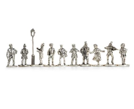 GROUP OF CONTINENTAL SILVER FIGURES, some marked, others unmarked, one modelled as a male by a street light, another as a fig