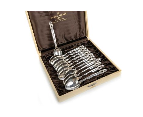 SET OF TWELVE DANISH SILVER TEASPOONS, GEORG JENSEN in the acorn pattern, with impressed 'GJ' mark, in fitted case11.1cm long