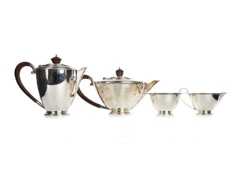 GEORGE V SILVER FOUR PIECE TEA SERVICE, HENRY CLIFFORD DAVIS, BIRMINGHAM 1934 of tapering circular form, raised on stepped ba