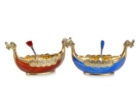 TWO NORWEGIAN SILVER GILT AND ENAMEL SALT CELLARS, THEODORE OLSEN  comprising red and blue ground examples, both with enamell