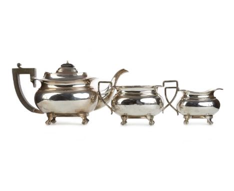 SILVER THREE PIECE TEA SERVICE, ATKIN BROTHERS, BIRMINGHAM MARKS each of oblong form, on four claw and ball feetthe teapot 30