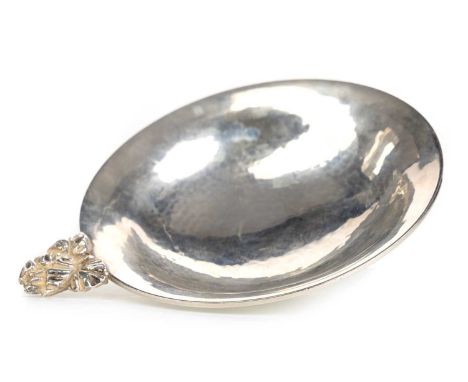 GEORGE VI SILVER WINE TASTER, CHARLES BOYTON, LONDON 1939 of circular form with hammered finish, raised on a circular base11c