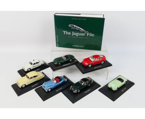 unknown maker - A collection of 7 unboxed Jaguar Cars still on their original plinths including XK Coupe, E Type and C Type. 