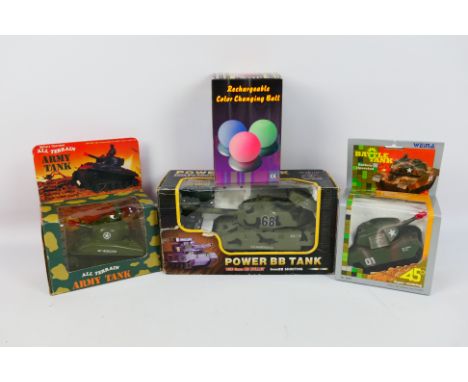 BB - Weina - All Terrain - A group of four plastic tanks, one unboxed, including A Radio Control Power BB Tank (3881) and two