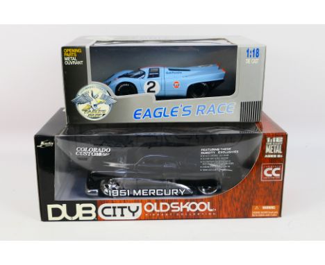 Jada - Two boxed diecast 1:18 scale model cars. Lot consists of Jada 'Dub City - Oldskool' collection #90049 1951 Mercury; to