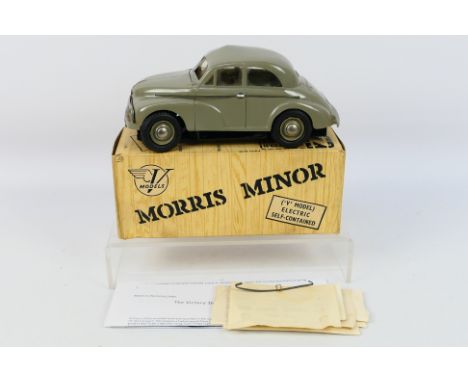 Victory Industries - A boxed motorised V Model Morris Minor low light model in grey. The car appears in Very Good condition o