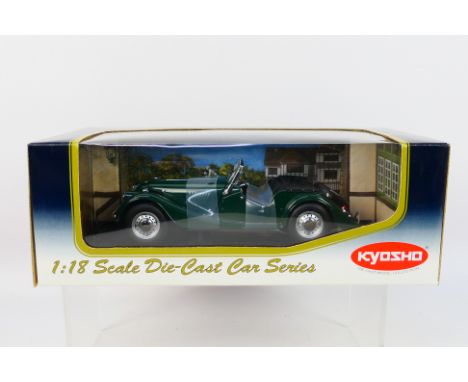 Kyosho - A boxed Kyosho #08111G Morgan 4/4 Series III.  The model in green appears to be in Mint condition, housed in a Near 