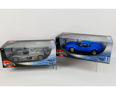 Hot Wheels - Two boxed '100% Hot Wheels' 1:18 scale diecast model cars. Lot consists of #29225 Cadillac LMP; together with #5