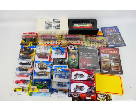 Hot Wheels - Atlas - A group of boxed / carded vehicles including Hot Wheels Ford Escort, Austin Mini Van, Grave Digger and o