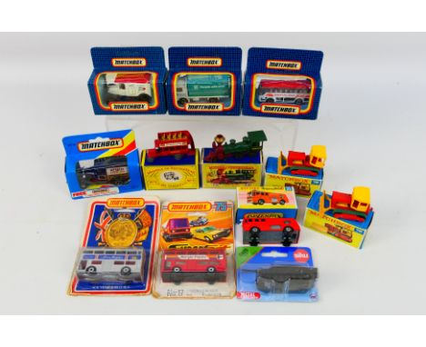 Matchbox - Siku - A selection of 12 diecast vehicles comprising of Case Tractor(#16)x2, Merryweather fire engine(#15), Sante-