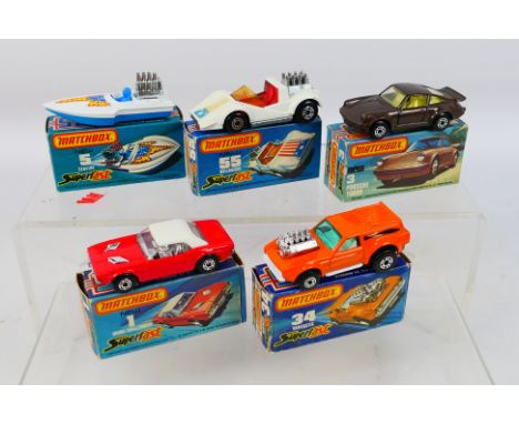 Matchbox Superfast - Five boxed Matchbox Superfast diecast model vehicles. Lot includes MB 3E Porsche Turbo; MB 55C Hellraise