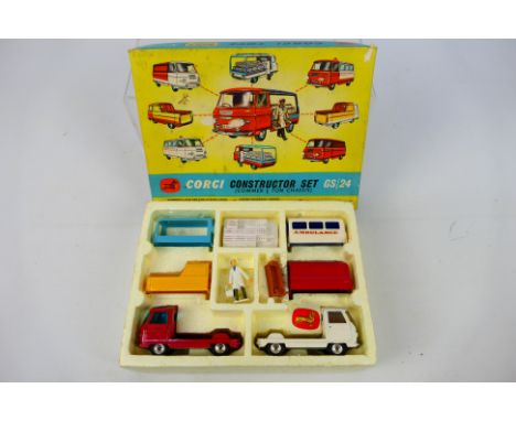 Corgi Toys - A boxed Corgi Toys GS24 Commer Constructor Gift Set. The set includes two Commer Chassis in red and white with 4