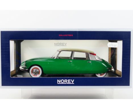 Norev - A boxed 1:18 scale Norev #181480 Citroen DS19. The model with green body and champagne roof appears to be in Mint con