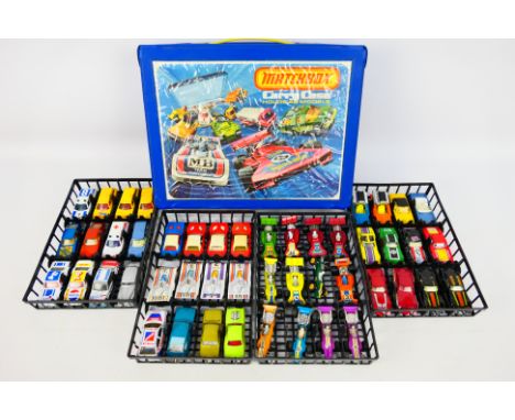 Matchbox - A 1975 Matchbox carry case containing 48 Matchbox diecast model cars from various ranges. Cars include Matchbox Su