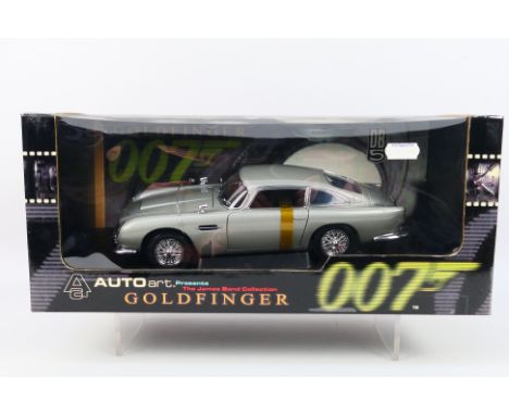 AutoArt - A boxed AutoArt #70020 1:18 scale 'The James Bond Collection' Aston Martin DB5 (RHD) from 'Goldfinger'. The model i