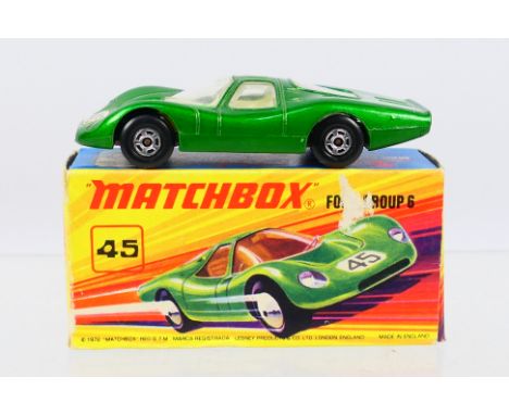 Matchbox Superfast - A boxed Matchbox Superfast 45A Ford Group 6. The model in dark metallic green with RN45 square label; cl