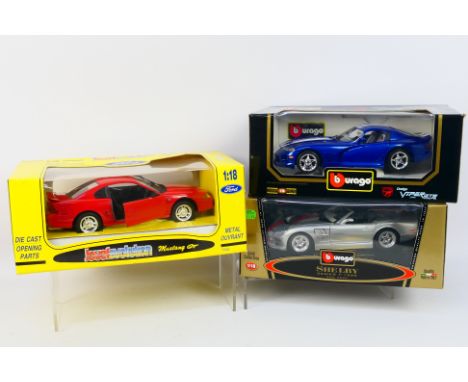 Bburago - Jouef - Three boxed diecast 1:18 scale model cars. Lot consists of Bburago #3030 1996 Dodge Viper GTS Coupe; #3323 