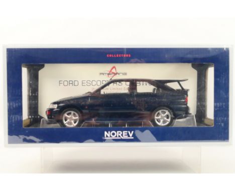 Norev - A boxed 1:18 scale Norev #182777 Ford Escort Cosworth 1992. The model in metallic dark blue appears to be in Mint con