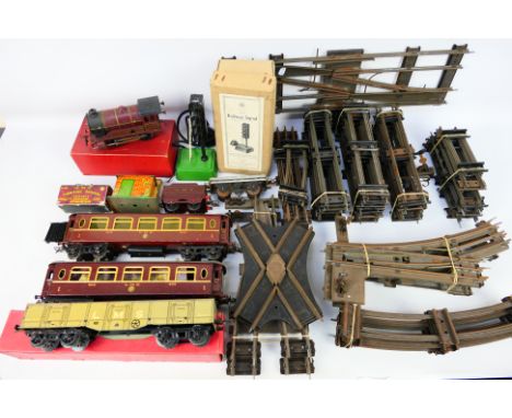 Hornby Trains - S.E.L. - Model Railways - Tinplate - Clockwork O gauge tinplate 0-4-0 locomotive number 5600 in LMS maroon wi