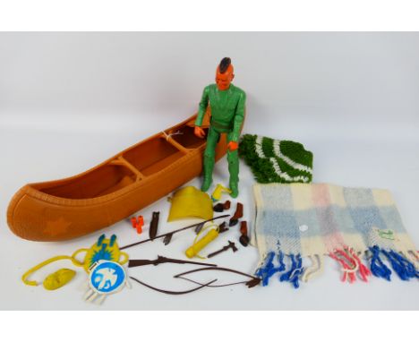 Johnny West - An unboxed vintage Johnny West figure comprising of a 12" poseable native American action figure with accessori