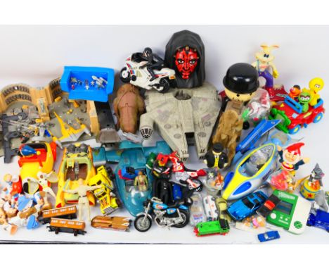 Kenner - Hasbro - Galoob - Tyco - Others - An assortment of unboxed vintage action figures and toys. Lot includes Galoob Star