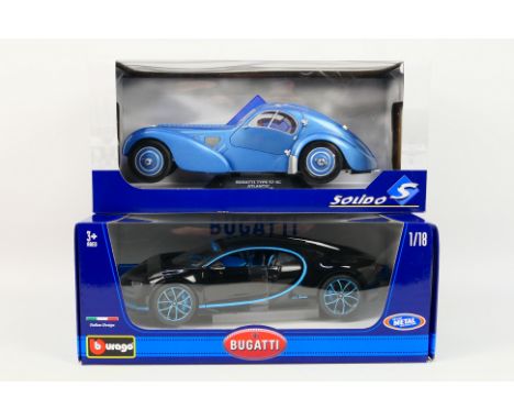 Solido - Bburago - Two boxed diecast 1:18 scale Bugatti model cars. Lot consists of Solido S1802102 Type 57 SC Atlantic; with