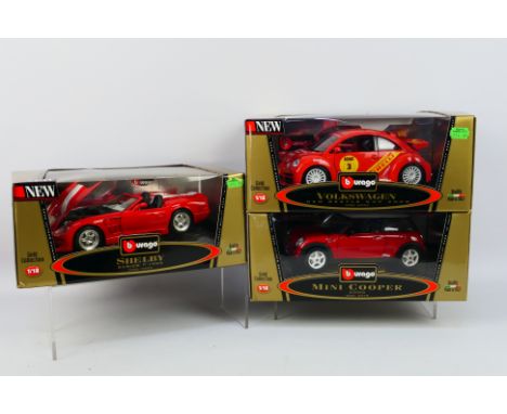 Bburago - Three boxed 1:18 scale diecast model cars from Bburago's 'Gold Collection'. Lot consists of #3353 1999 Shelby Serie