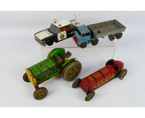 Mettoy - Ichiko - A clockwork Mettoy tractor with working motor, a clockwork Mettoy lorry, motor not working, a clockwork rac