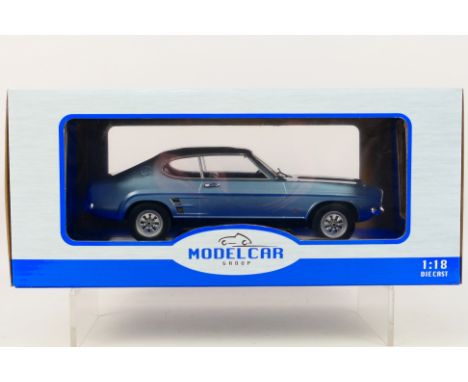 Model Car Group - A boxed 1:18 scale Model Car Group MCG18084 Ford Capri Mk.I 1973. The model in metallic blue appears to be 