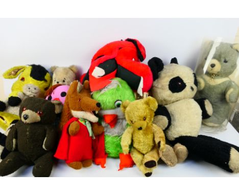 Wendy Boston - Pedigree - Chiltern - A group of vintage teddy bears including a Wendy Boston Basil Brush and a Panda, a pull 