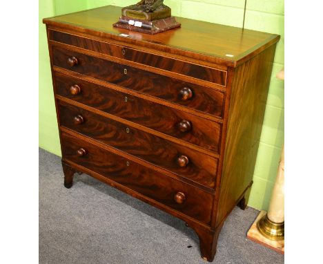 A Regency mahogany, crossbanded and boxwood strung straight front chest of drawers, early 19th century, with a narrow frieze 