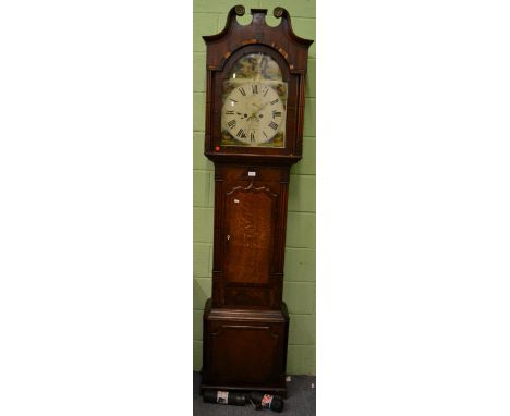 A Victorian eight day oak and mahogany cross band longcase clock with painted arched dial  