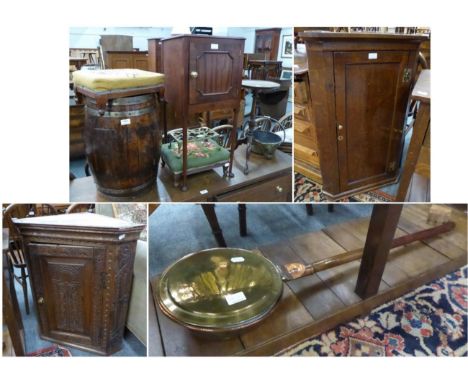 A carved oak corner cupboard, another oak corner cupboard, a side table, two foot stools, a brass pan, a tripod table, a triv