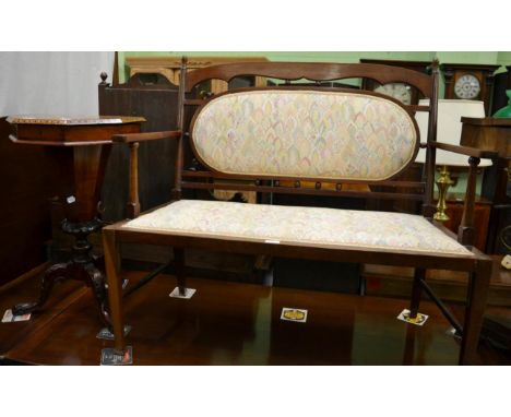 An early 20th century two seater sofa and a Victorian work table with parquetry top 