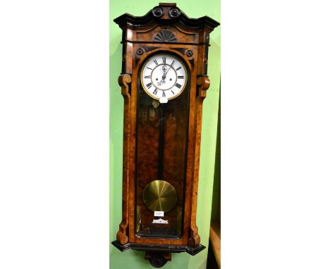 A walnut veneered double weight driven Vienna type wall clock
