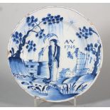 An 18th century Bristol delft plate with "Long Liza" in landscape, inscribed AV 1748, 8 6/8" dia (