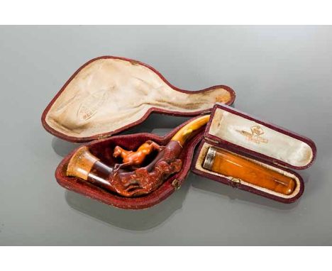 AUSTRIAN MEERSCHAUM PIPE leather cased, carved in the form of a horse and a wolf, 13cm long together with a silver mounted am