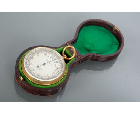 EDWARDIAN CASED POCKET BAROMETER maker Aitchison of London, with silvered compensated dial, in a red leather case, 7cm long