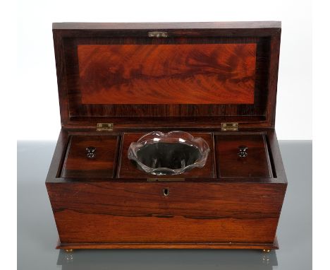 REGENCY ROSEWOOD SARCOPHAGUS TEA CADDY the interior with two tea compartments, a glass bowl and silver caddy spoon, 36cm long