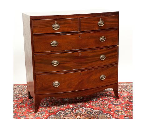 VICTORIAN BOWFRONT MAHOGANY CHEST on splayed bracket feet, 104cm high, 99cm wide 
