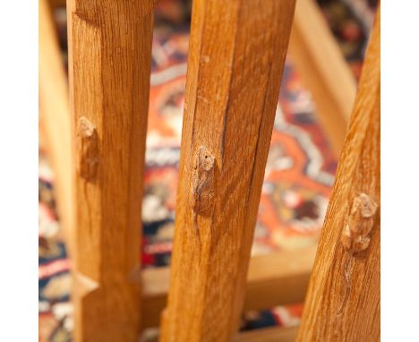 ROBERT 'MOUSEMAN' THOMPSON NEST OF THREE OAK TABLES with mouse signature, largest 47.5cm high, 61cm wide  