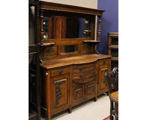 ART NOUVEAU OAK HALL WARDROBEwith carved front and brass handles, 201cm high, 136cm wide