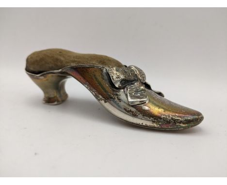 A late Victorian silver pin cushion in the form of a shoe, 33.5gLocation: 