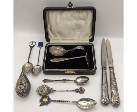 Mixed silver and white metal to include an enamelled teaspoon, 800 filigree spoon, boxed christening set and other items, wei