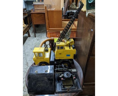 A Tonka toy model of a crane/truck, and a German GSN Company Schmidt Bros Nuremberg Stein child's toy black lacquered tinplat