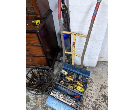 A mixed lot of tools, vintage sack barrow, iron weights, horse shoes and hanging wire flower basketsLocation: 
