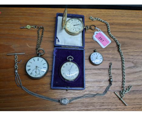 Three silver cased open faced pocket watches, one in a box, another a ladies example, a gold plated pocket watch, a Continent