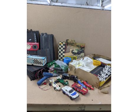 A Triang Scalextric track and model motor racing cars to include a Bentley MM/C64, BMW 3.0 CSL, TR7, and others along with Sc
